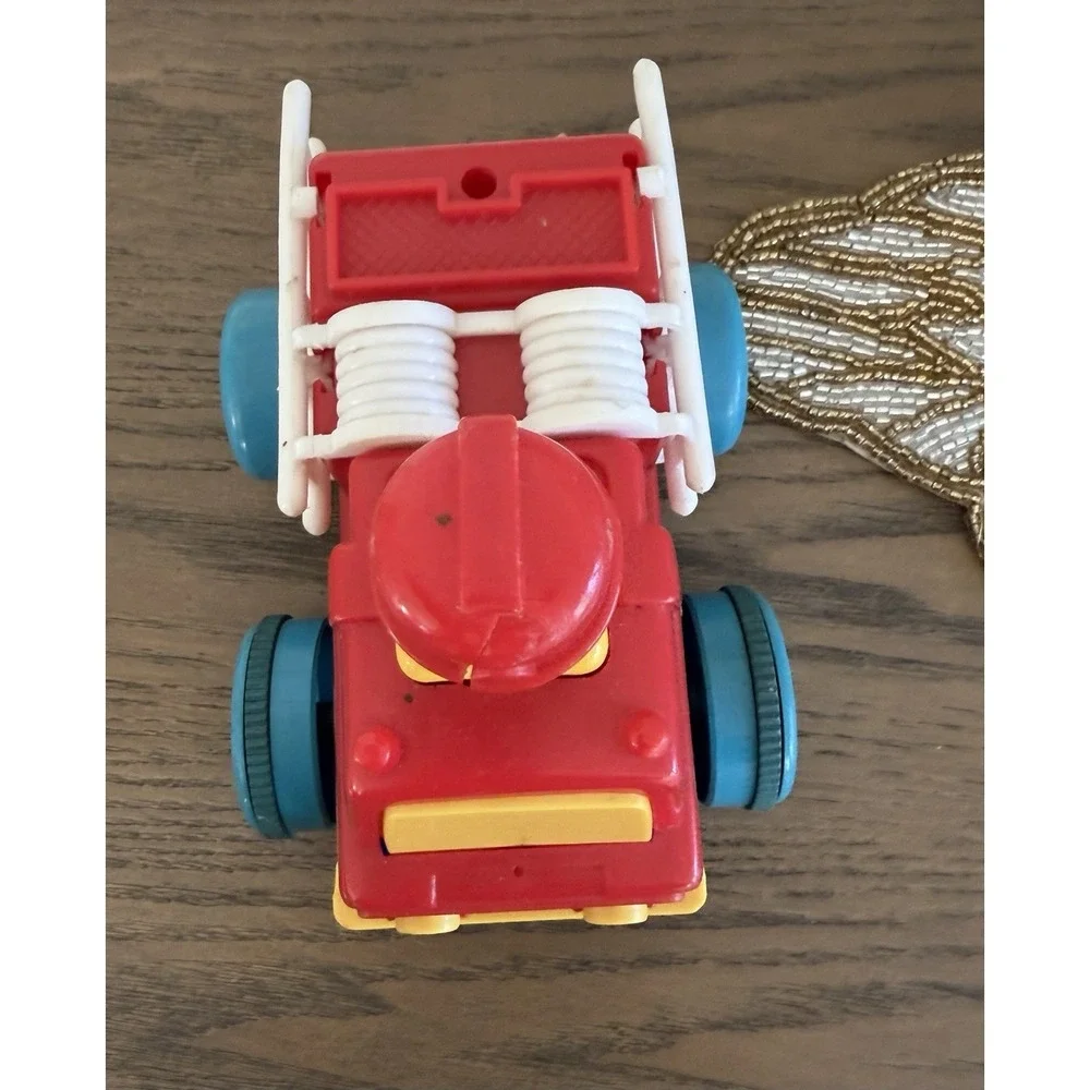 Vintage Push N Go Fire Truck Toy 1975 TOMY Taiwan‎ Pop Up Driver Vehicle